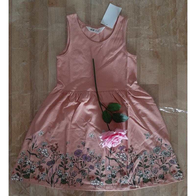 Children's dress with flowers at the bottom