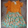 Girls set: Girls blouse orange with frills and skirt green with oranges