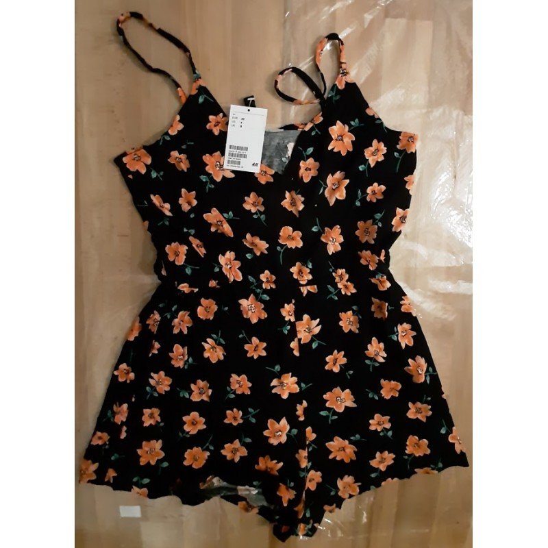 Damesromper/ Jumpsuit oranje bloemen