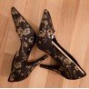 Women's shoe - Chic black pumps with gold-colored floral print